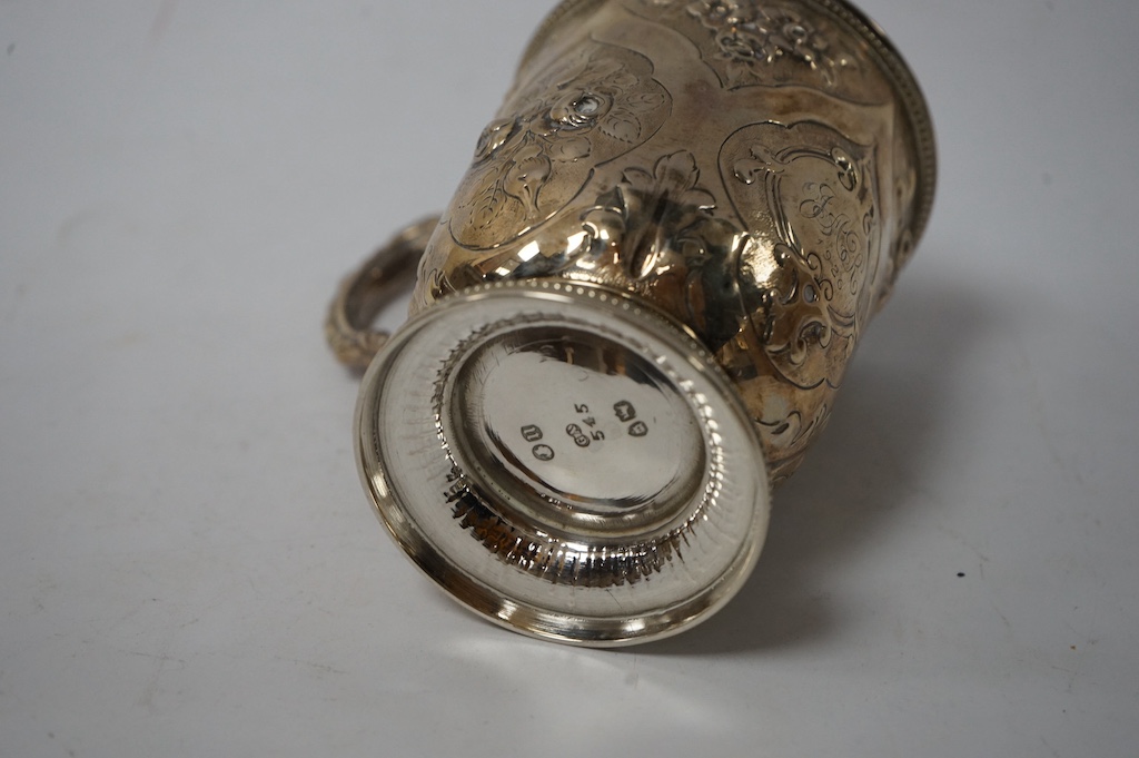 Assorted small silver including a small Reynolds Angels pin tray, Birmingham, 1900, 11.1cm, one other small dish, a modern mounted timepiece, a French mounted glass salts bottle, a photograph frame, a mounted glass whisk